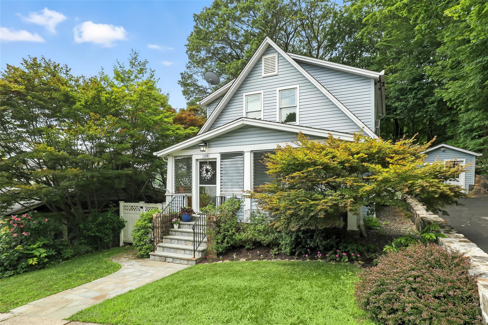 210 Husted Avenue Peekskill, NY 10566 - Photo 1 of 1 View of front of home featuring a front lawn