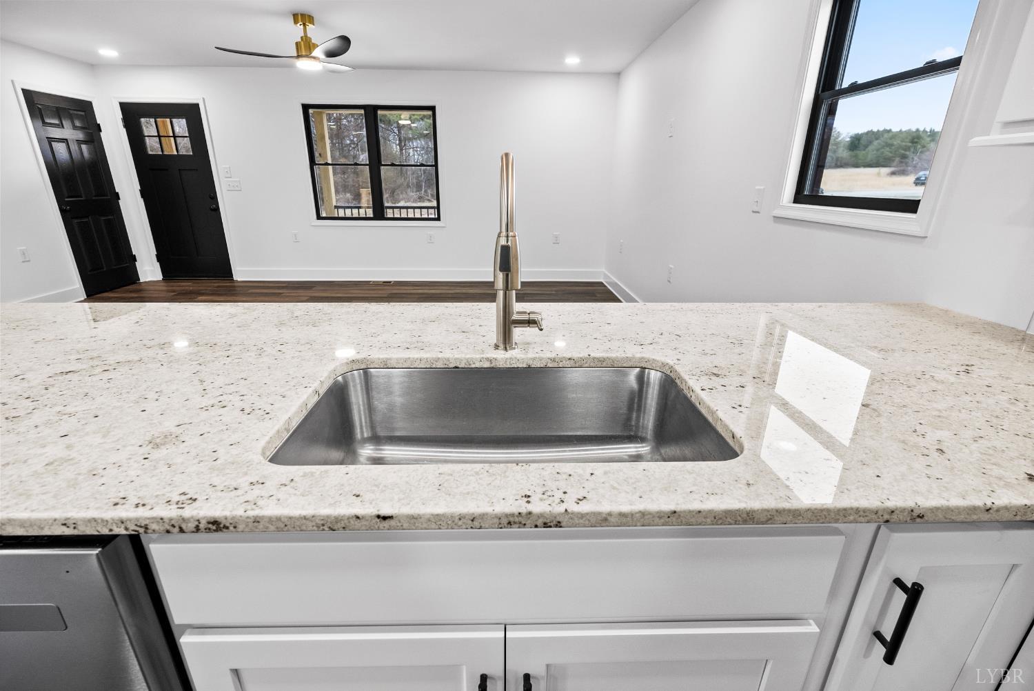 112 Savage Drive Rustburg, VA 24588 - Photo 12 of 51 a kitchen with granite countertop a sink and a granite top