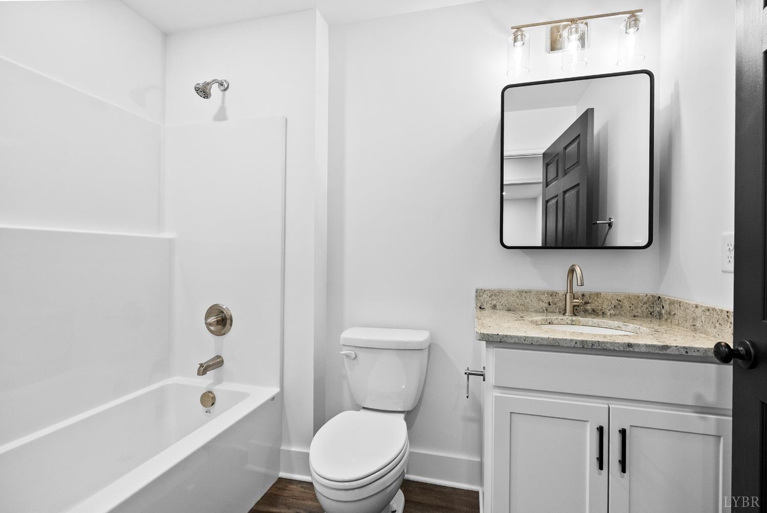 112 Savage Drive Rustburg, VA 24588 - Photo 17 of 51 a bathroom with a toilet sink and bathtub