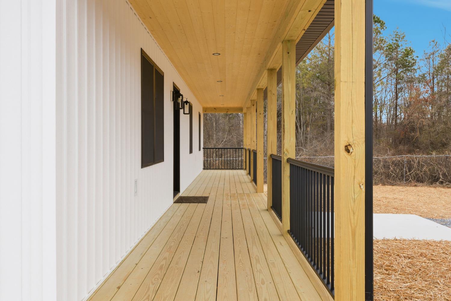 112 Savage Drive Rustburg, VA 24588 - Photo 4 of 51 a view of a balcony with wooden floor