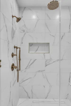 a view of an entryway with a floor to ceiling window