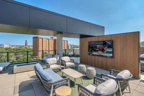 a kitchen with stove and cabinets