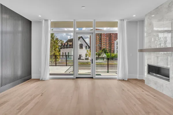 a view of entryway with wooden floor
