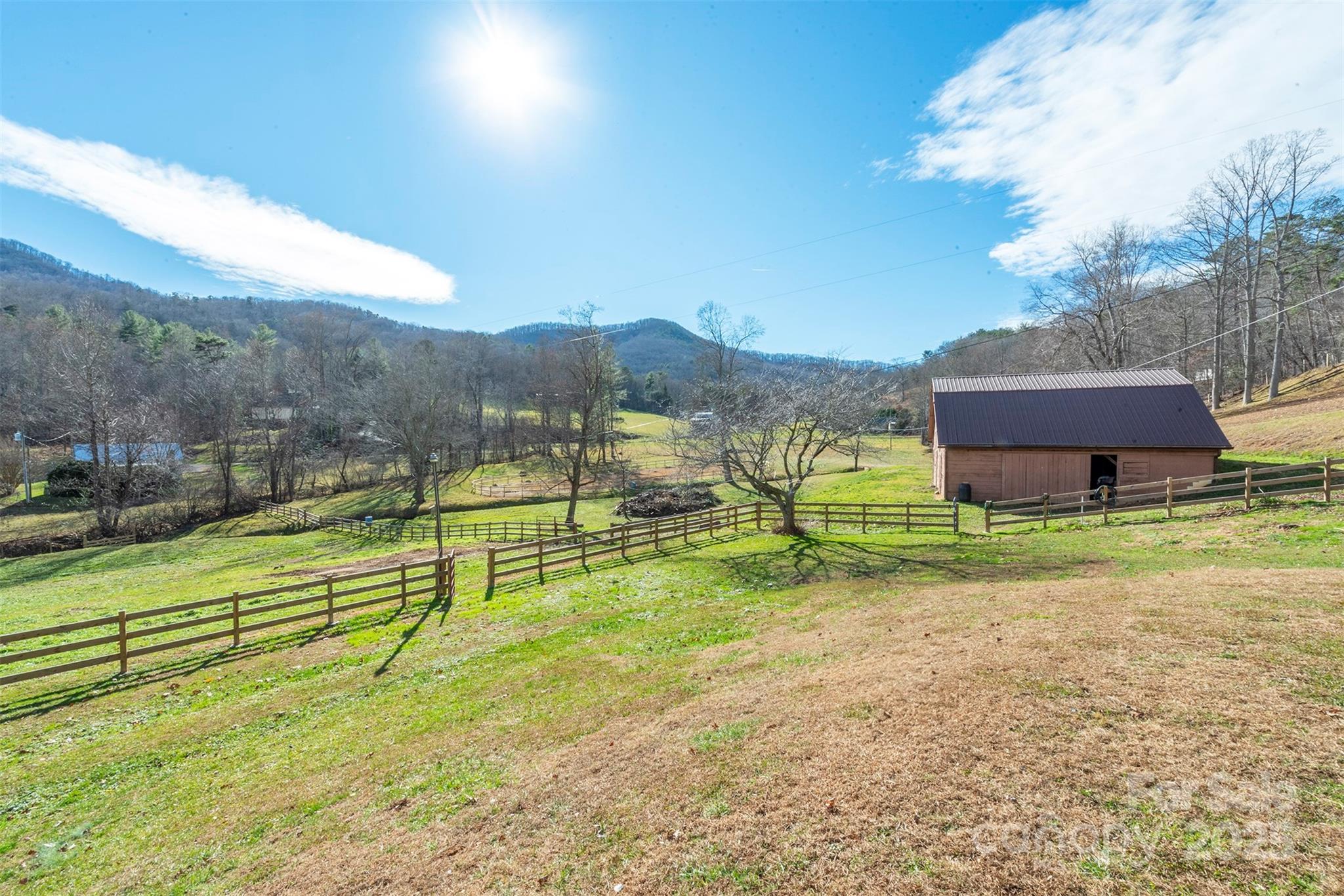 366 Dix Creek Road 2 Road, Unit 2 Leicester, NC 28748 - Photo 1 of 48 a view of a house with a yard