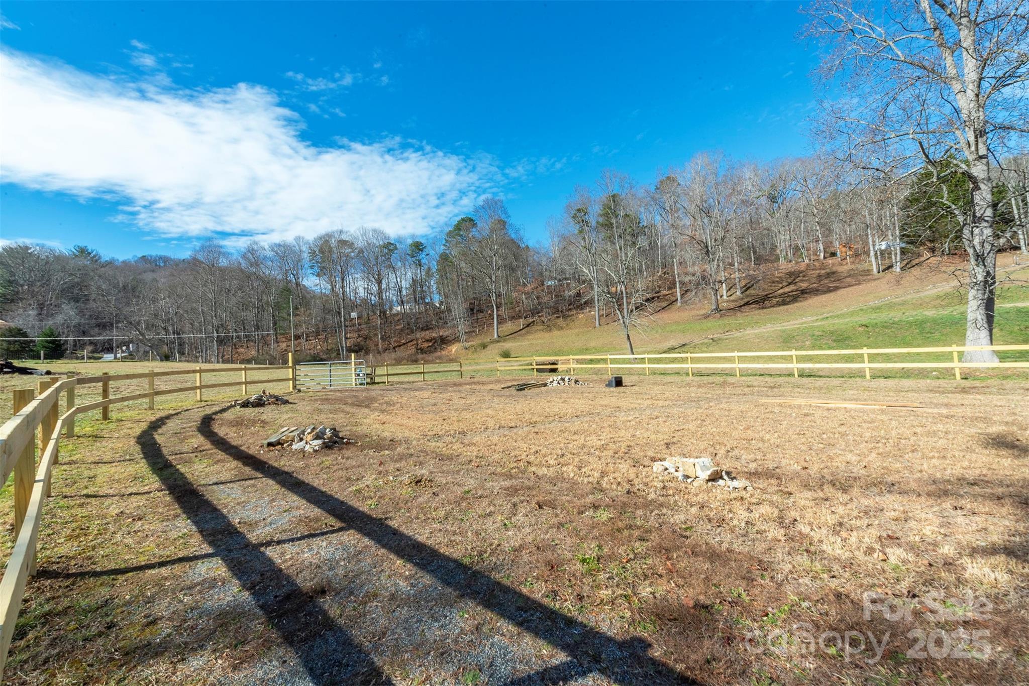 366 Dix Creek Road 2 Road, Unit 2 Leicester, NC 28748 - Photo 32 of 48 a view of a swimming pool with a lake view and mountain in the back