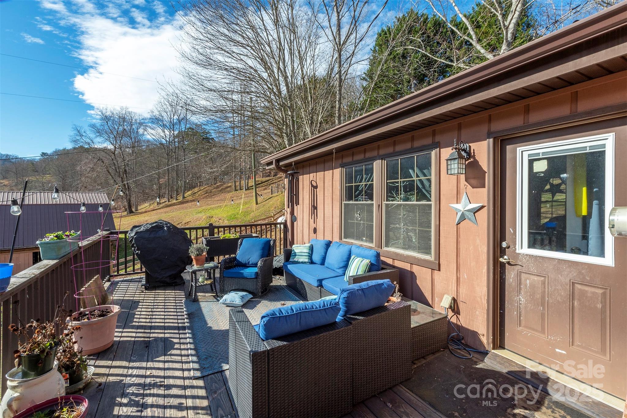 366 Dix Creek Road 2 Road, Unit 2 Leicester, NC 28748 - Photo 38 of 48 a view of couches in the balcony