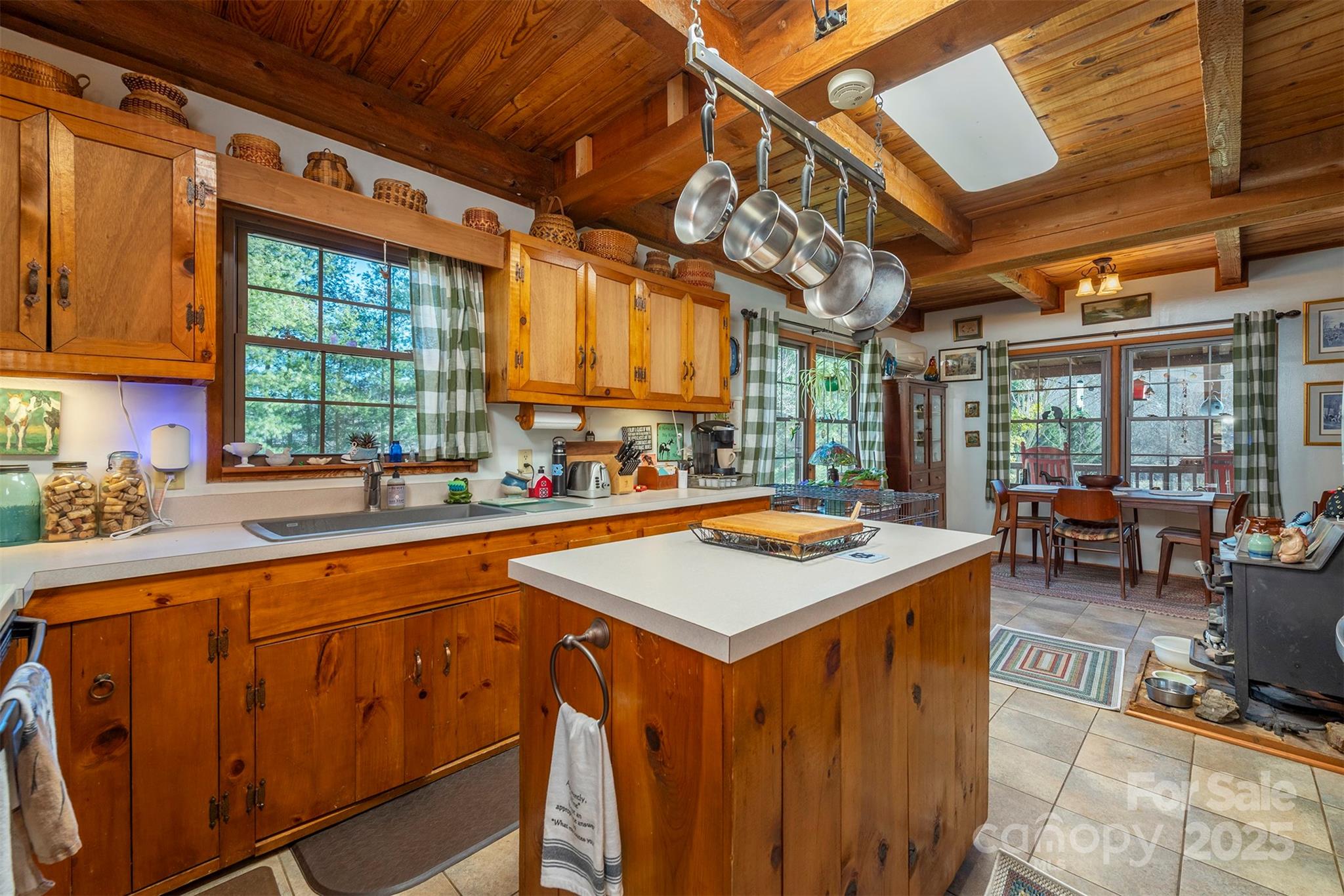 366 Dix Creek Road 2 Road, Unit 2 Leicester, NC 28748 - Photo 5 of 48 a kitchen with stainless steel appliances granite countertop a stove a sink dishwasher and cabinets with wooden floor