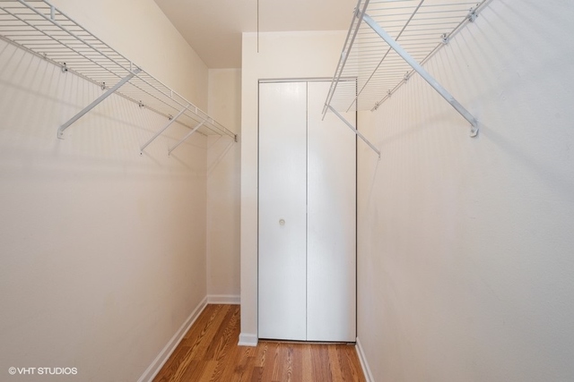 1905 North Hicks Road, Unit 205 Palatine, IL 60074 - Photo 7 of 10 a view of small space with empty racks