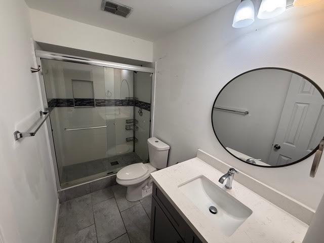 6533 Sweet Maple Lane Boca Raton, FL 33433 - Photo 11 of 20 a bathroom with a sink toilet and shower