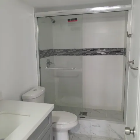 a living room with a fireplace