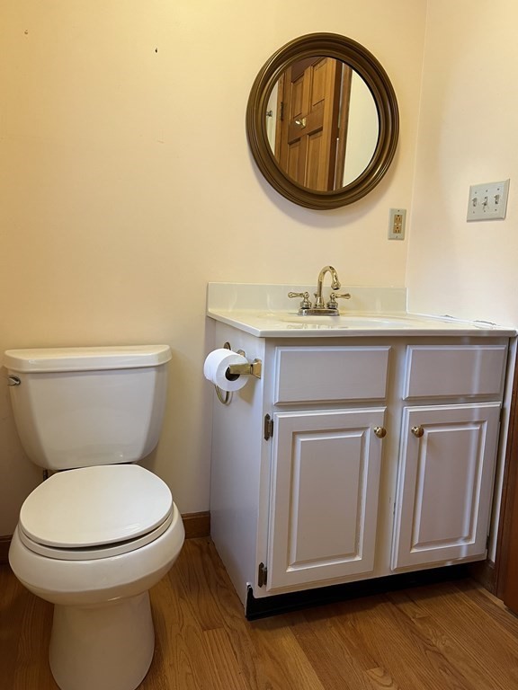 68 Deer Run Circle Barre, MA 01005 - Photo 13 of 26 a bathroom with a toilet a sink and a mirror