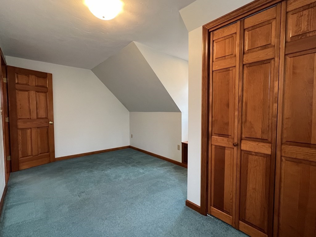 68 Deer Run Circle Barre, MA 01005 - Photo 19 of 26 an empty room with windows