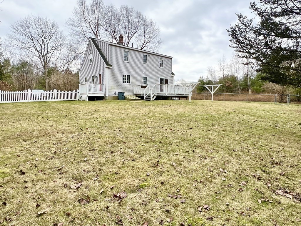 68 Deer Run Circle Barre, MA 01005 - Photo 25 of 26 a view of a white house with a yard