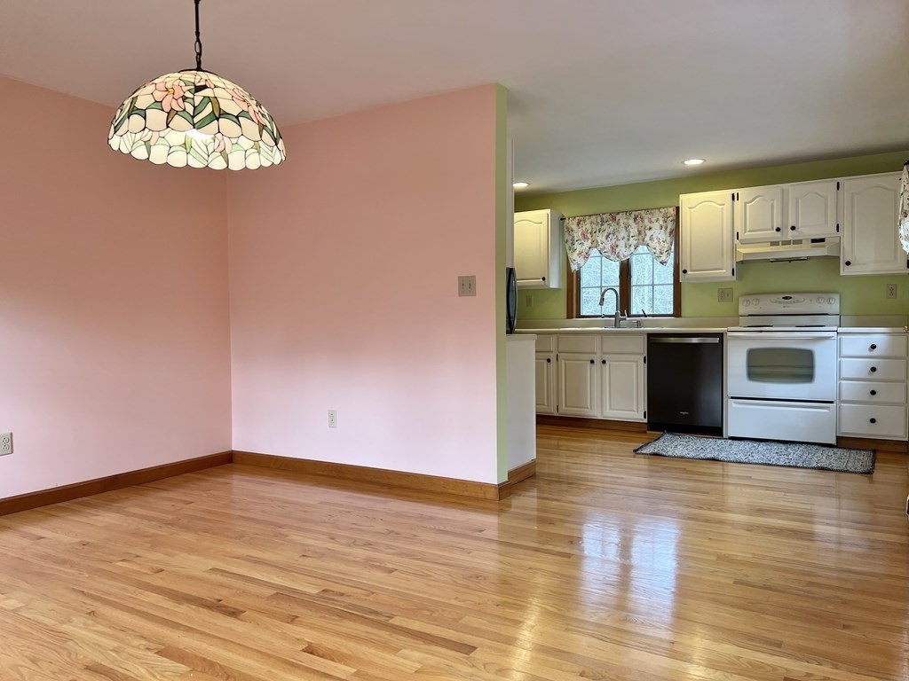 68 Deer Run Circle Barre, MA 01005 - Photo 10 of 26 a view of a kitchen with stove cabinets and wooden floor