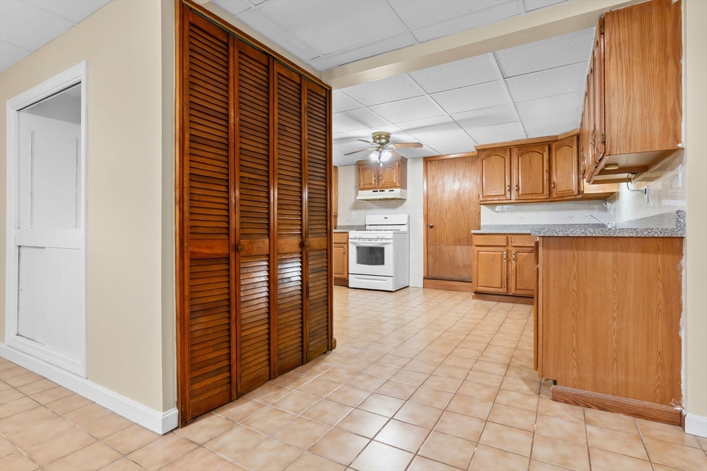 11 Wilson Avenue Wakefield, MA 01880 - Photo 24 of 42 a view of a kitchen with a sink