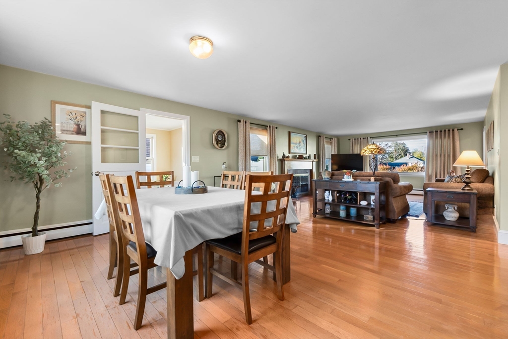 11 Wilson Avenue Wakefield, MA 01880 - Photo 7 of 42 a dining room with furniture and wooden floor
