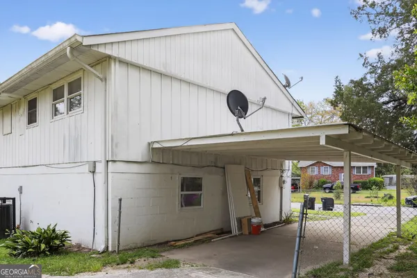 a view of a back yard of the house