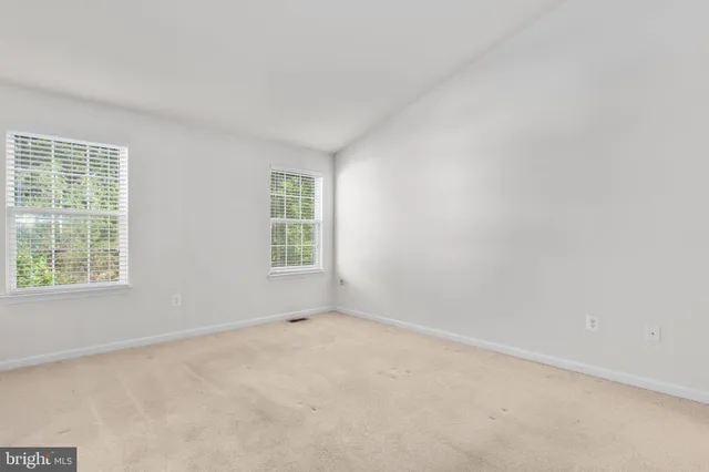 a bathroom with a bathtub and a sink