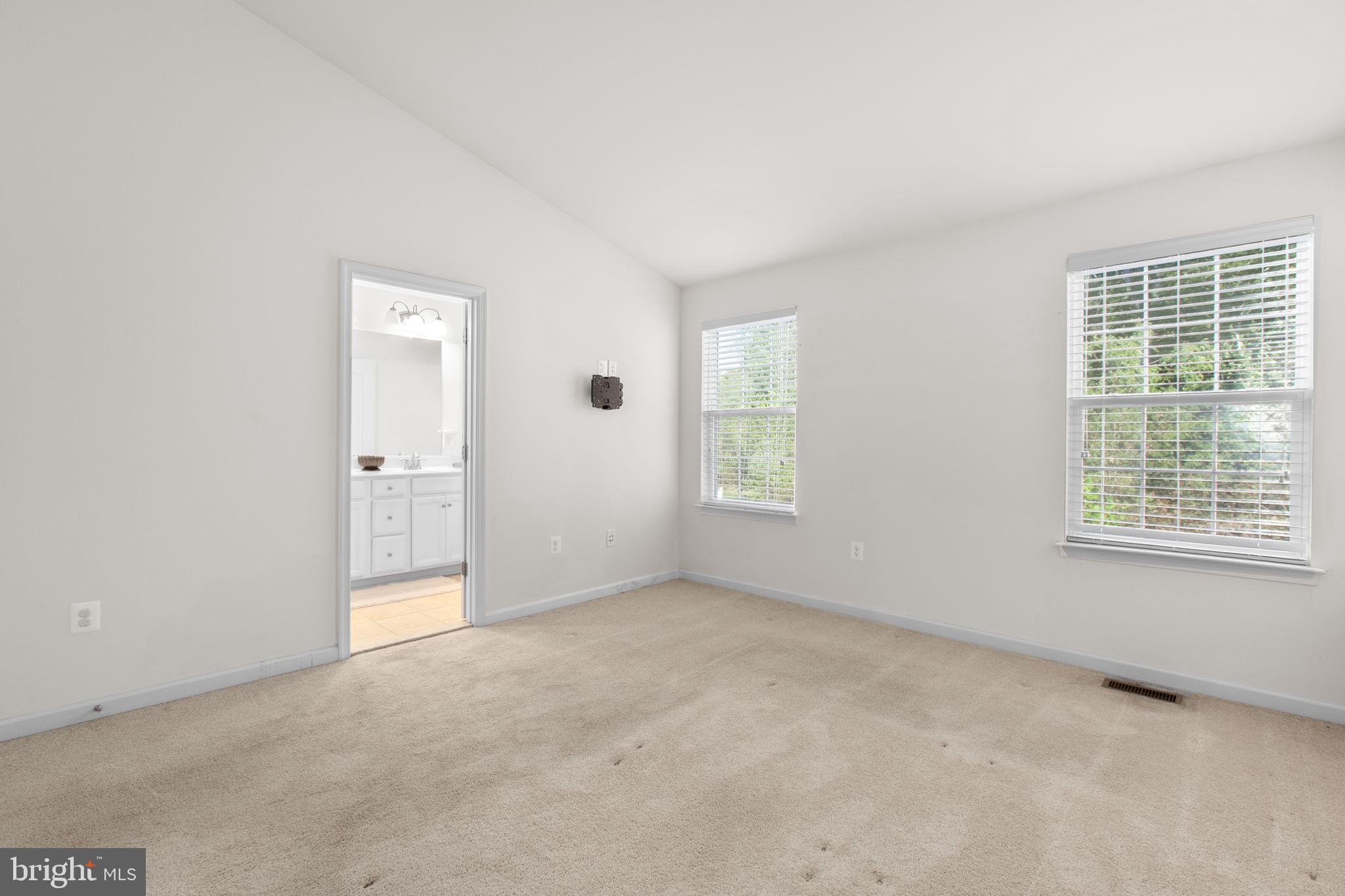 213 Hidden Brook Drive Fredericksburg, VA 22405 - Photo 32 of 55 Primary bedroom with high ceilings