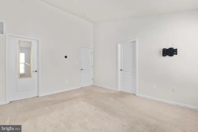 a view of balcony with wooden floor