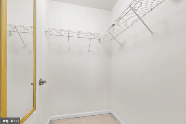 a view of a wooden fence and floor