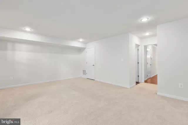 an empty room with an entryway