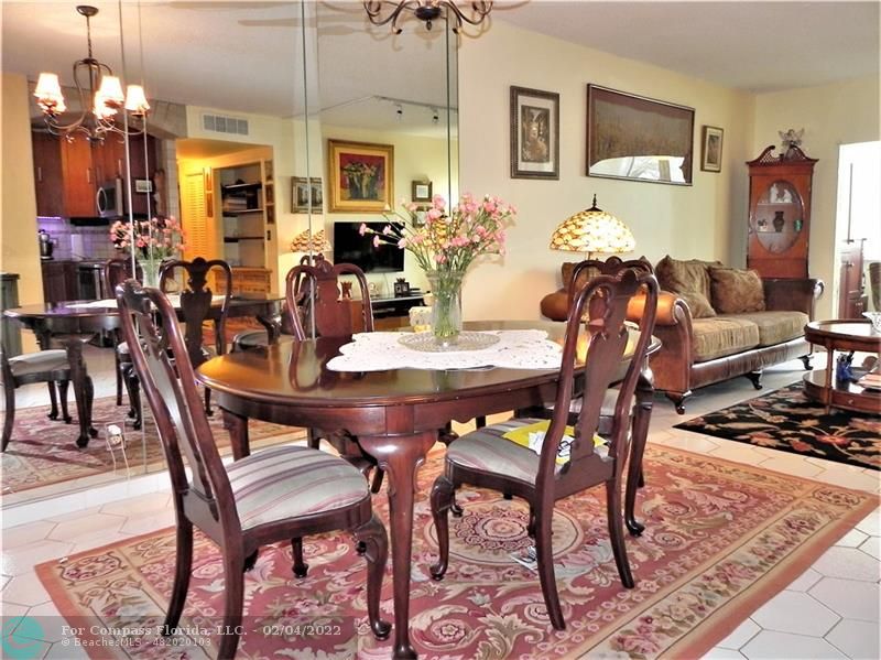4350 Hillcrest Drive, Unit 212 Hollywood, FL 33021 - Photo 10 of 38 a view of a dining room with furniture
