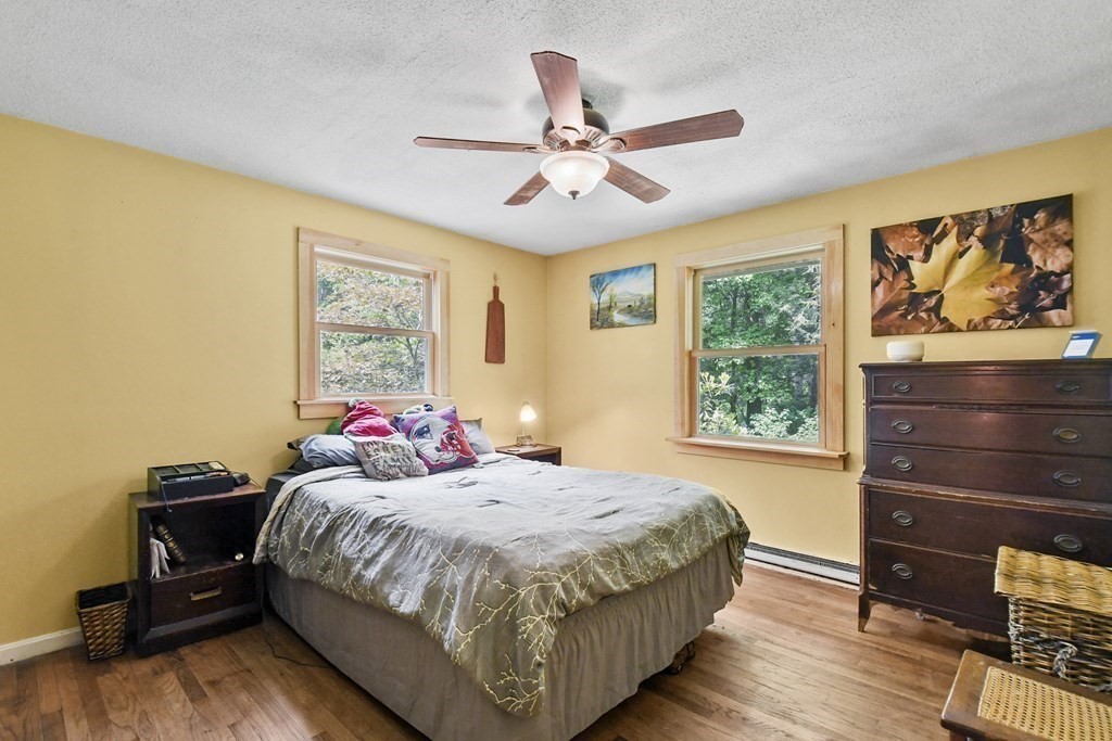 9 Number 6 Road Leverett, MA 01054 - Photo 12 of 26 a bedroom with a bed and a window