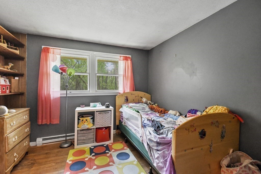 9 Number 6 Road Leverett, MA 01054 - Photo 14 of 26 a bedroom with bed and a window