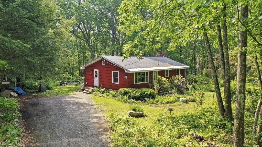 9 Number 6 Road Leverett, MA 01054 - Photo 2 of 26 a front view of a house with garden