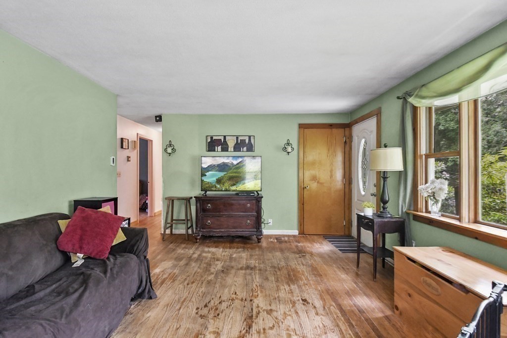 9 Number 6 Road Leverett, MA 01054 - Photo 9 of 26 a bedroom with furniture and a window
