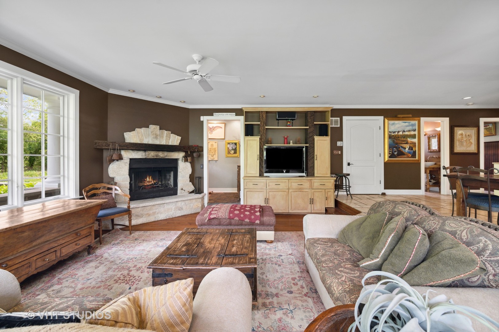 730 Glenview Road Glenview, IL 60025 - Photo 15 of 45 a living room with furniture large window and a fireplace