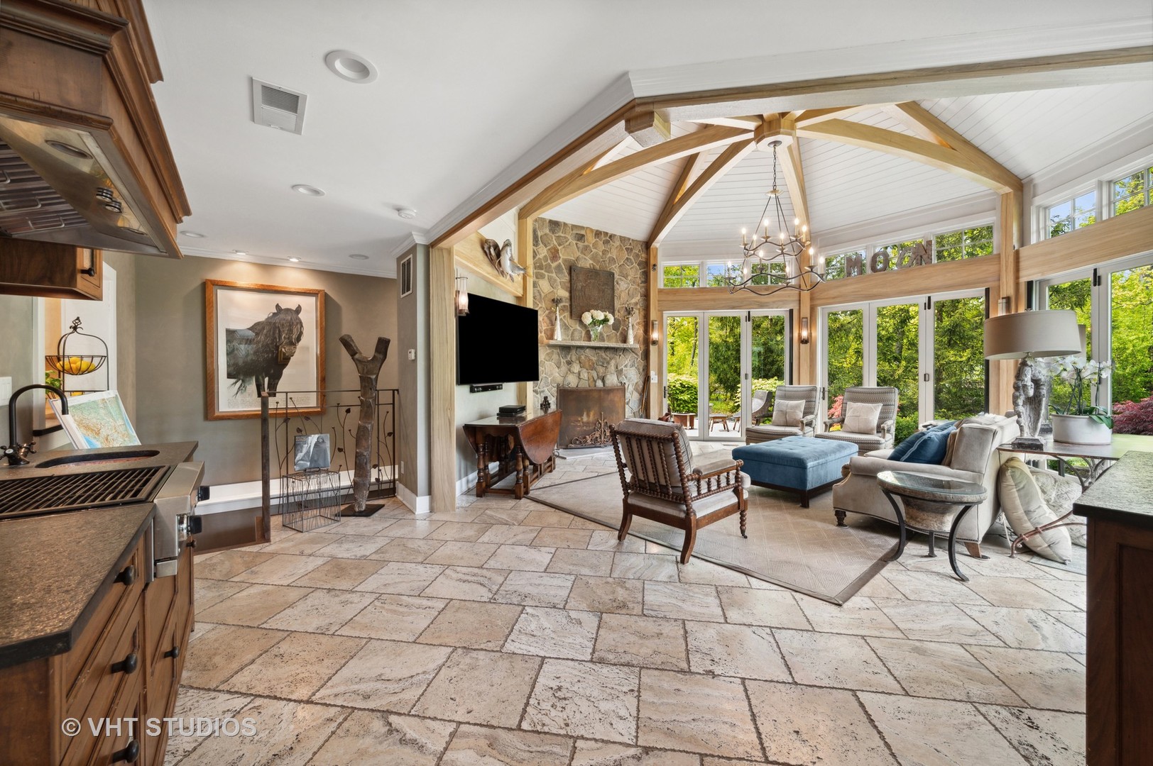 730 Glenview Road Glenview, IL 60025 - Photo 22 of 45 a living room with furniture a flat screen tv and floor to ceiling window