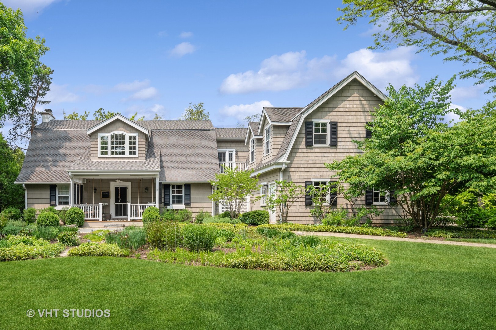 730 Glenview Road Glenview, IL 60025 - Photo 3 of 45 a front view of a house with a yard