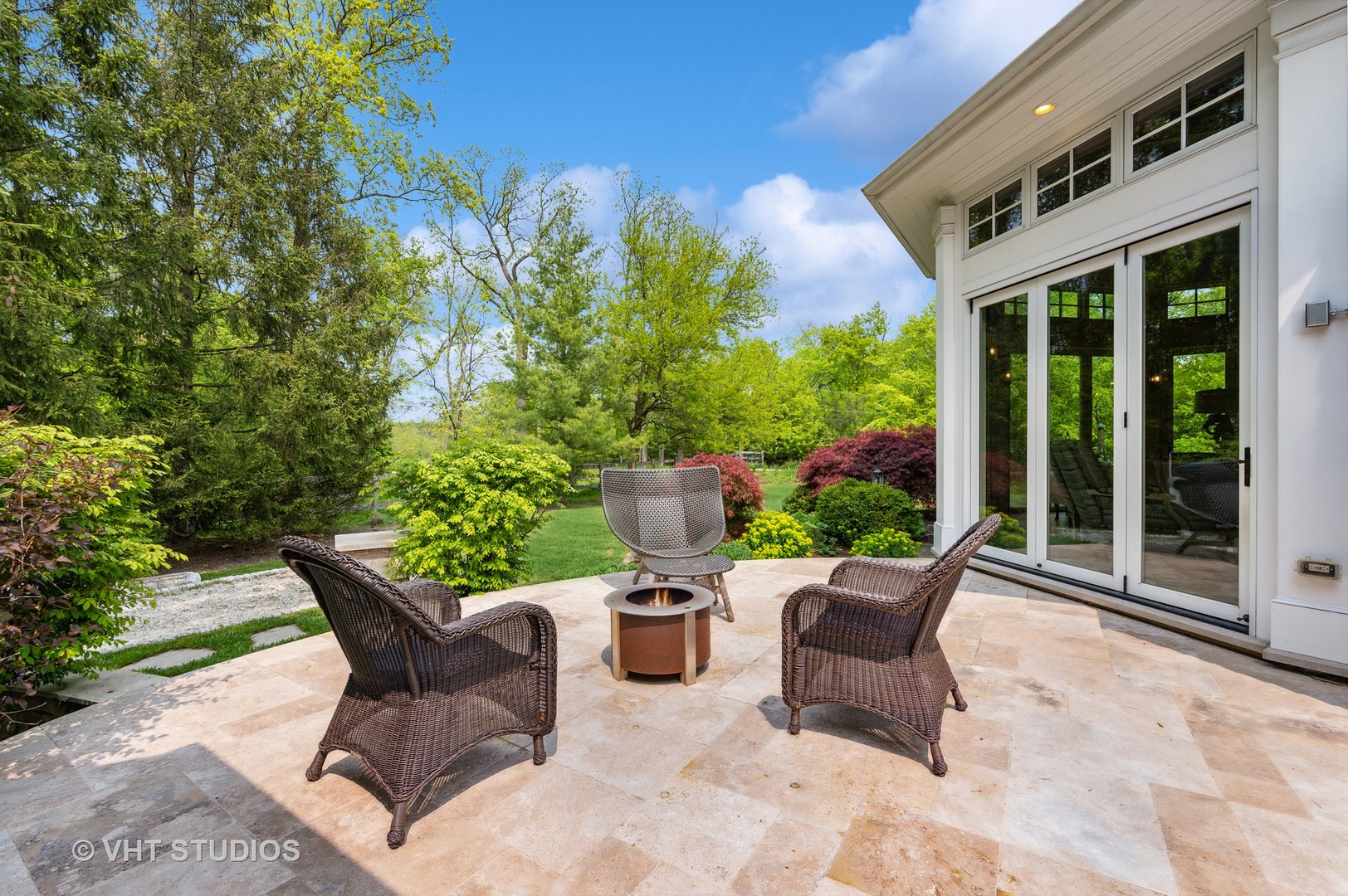 730 Glenview Road Glenview, IL 60025 - Photo 40 of 45 a view of a patio with table and chairs and potted plants