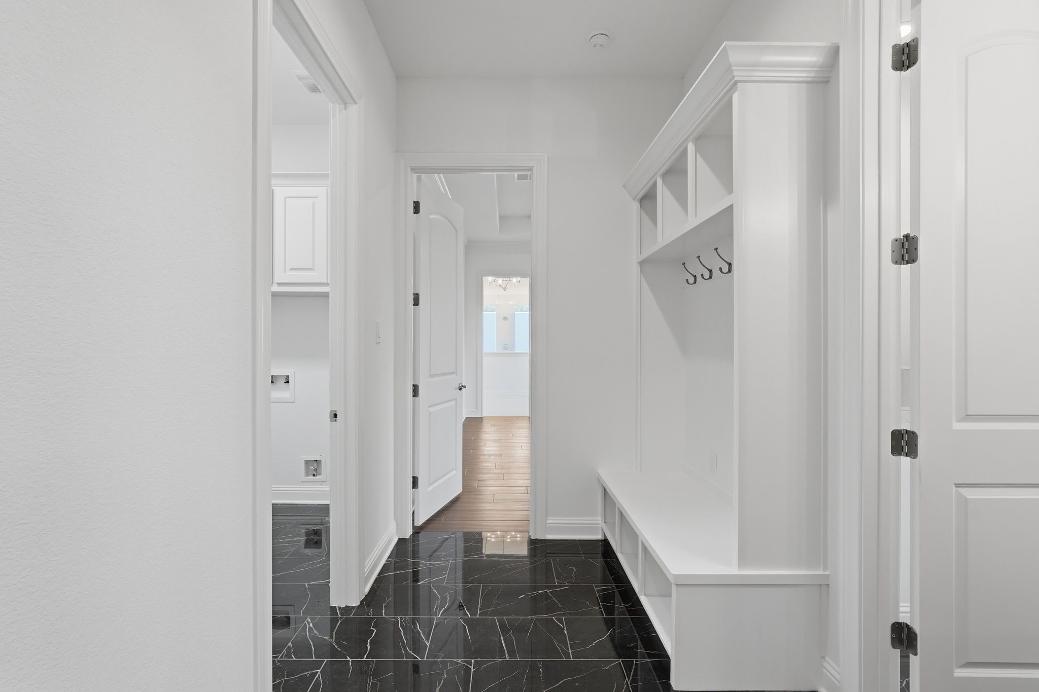 16081 Forest Mill Road Willis, TX 77378 - Photo 28 of 37 Custom mudroom features built-in storage, organization lockers, and convenient space for everything from school bags to outdoor gear.