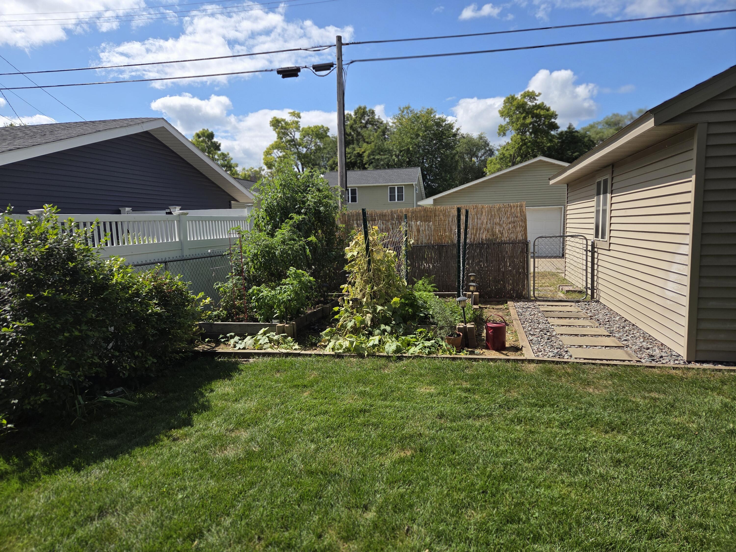 1212 7th Street South La Crosse, WI 54601 - Photo 22 of 37 sideyard and garden