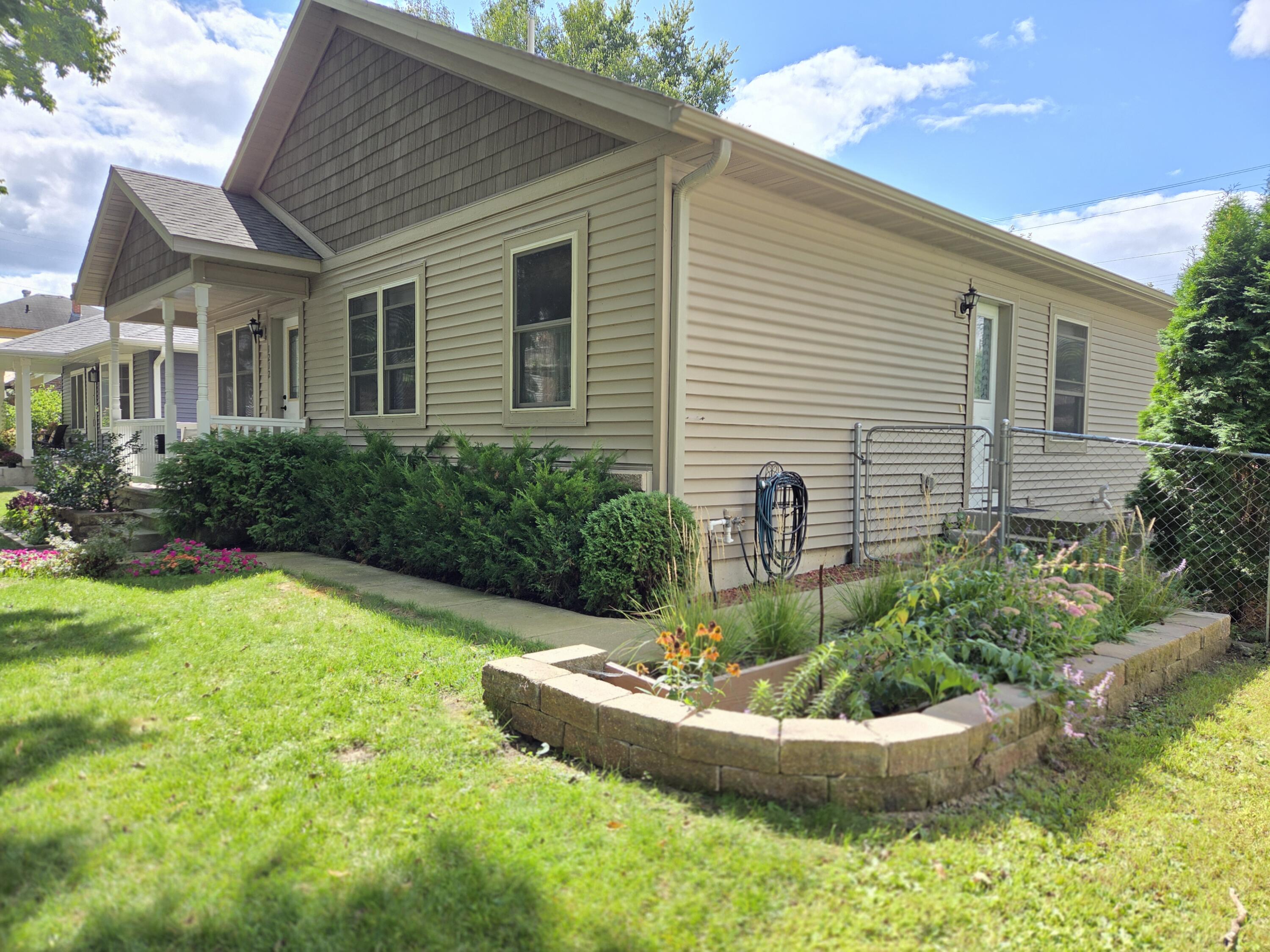 1212 7th Street South La Crosse, WI 54601 - Photo 24 of 37 sideyard with water garden