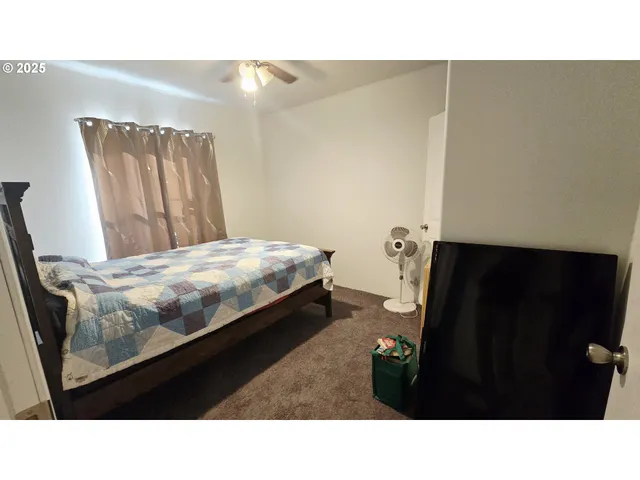 a bathroom with a toilet and a sink