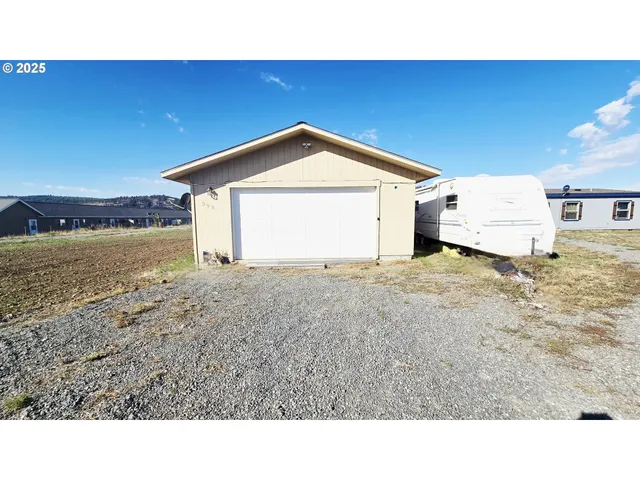 a black and white photo of a house