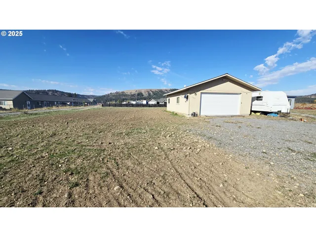 a black and white photo of a field