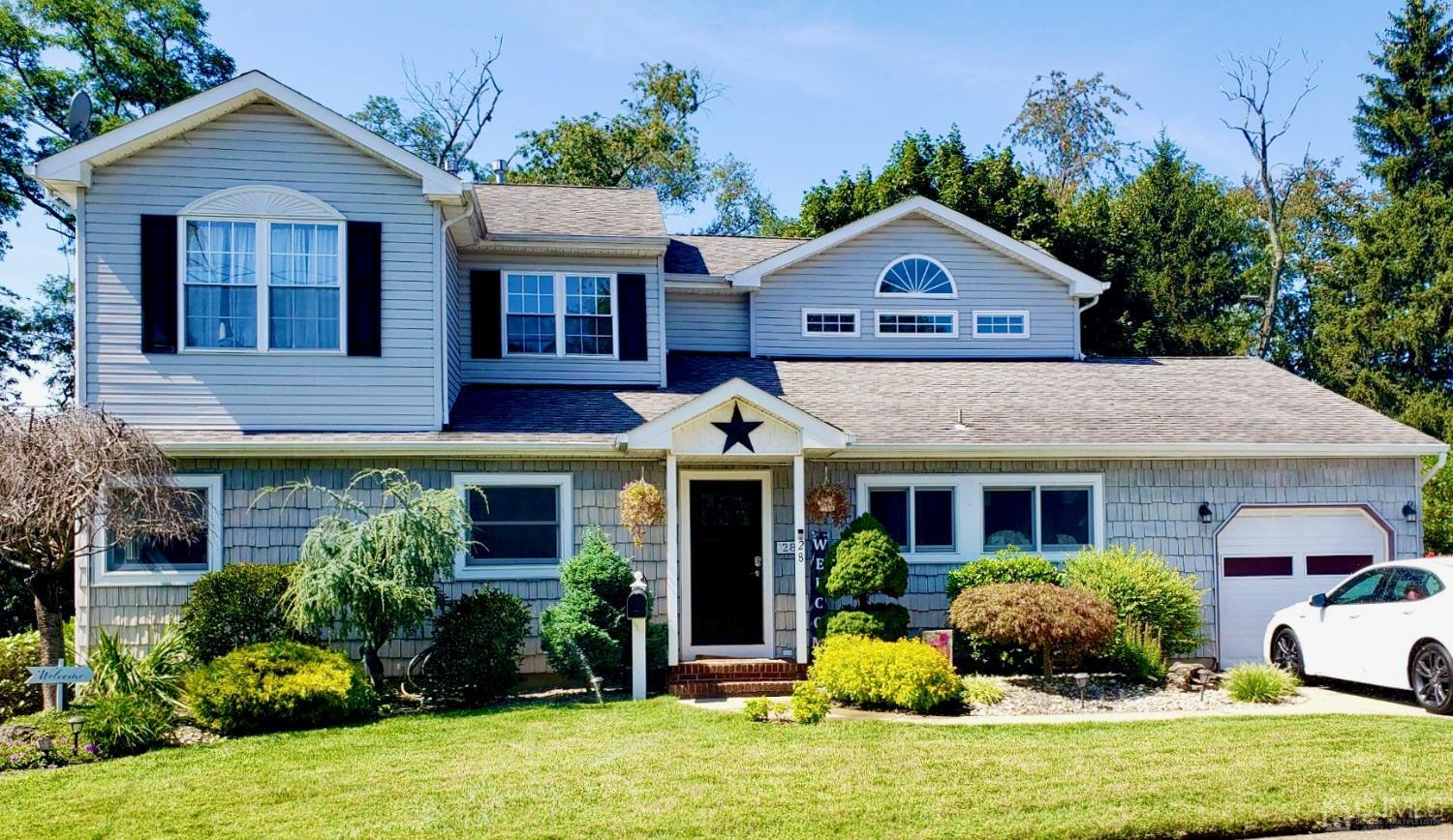 Summer 2023 view of front of home