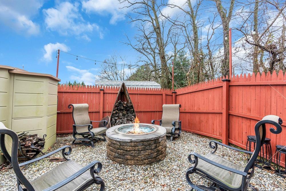 28 Ridgeview Road Jamesburg, NJ 08831 - Photo 45 of 46 View of firepit and firewood holder. Shed to the left