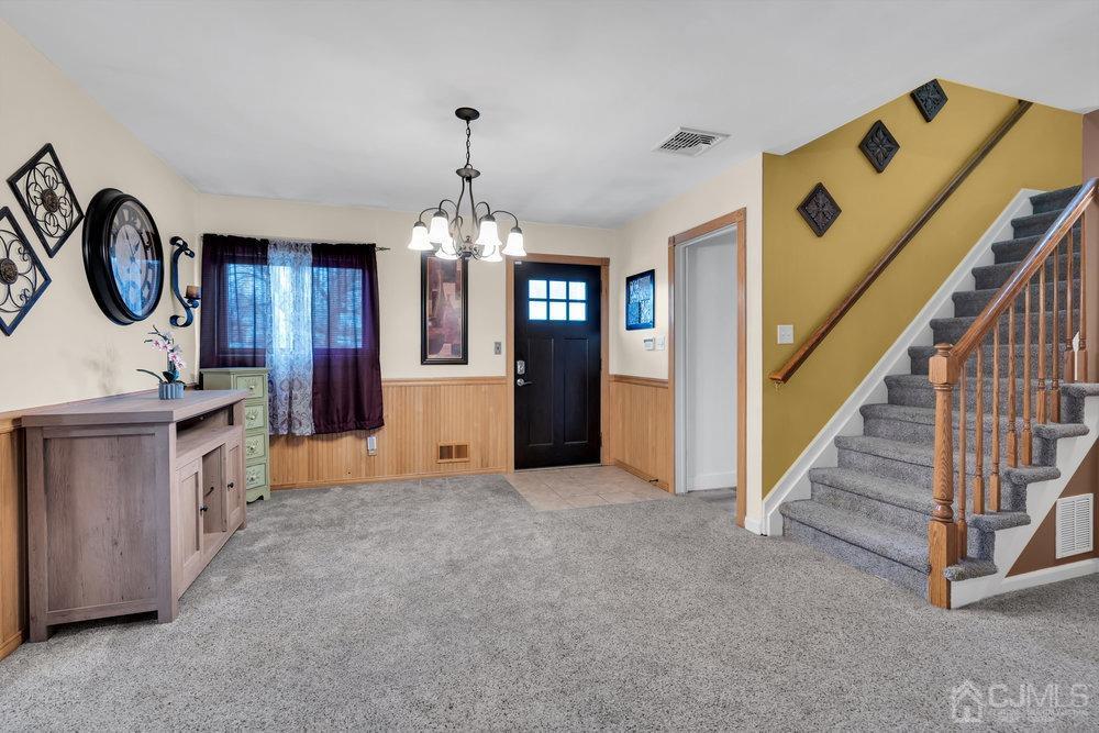 View from Living Room of Dining Area and Foyer