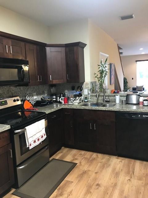 The Ridges Weston, FL 33331 - Photo 16 of 19 a kitchen with sink and cabinets