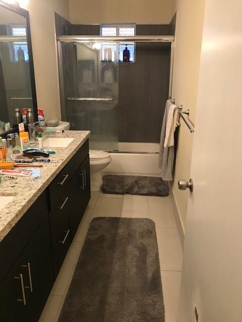 The Ridges Weston, FL 33331 - Photo 10 of 19 a bathroom with a granite countertop sink toilet and shower