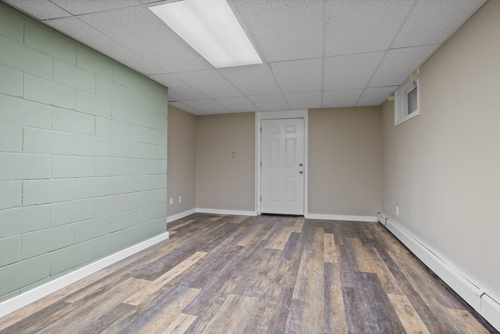 18 Higley Road Ashland, MA 01721 - Photo 33 of 42 a view of empty room with wooden floor