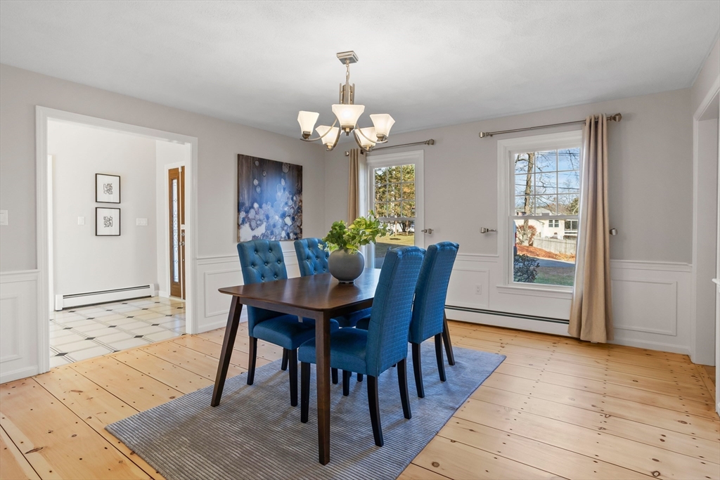 18 Higley Road Ashland, MA 01721 - Photo 10 of 42 a view of a dining room with furniture window and wooden floor