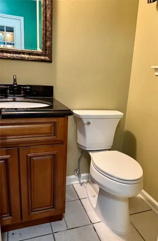 a bathroom with a toilet and a sink