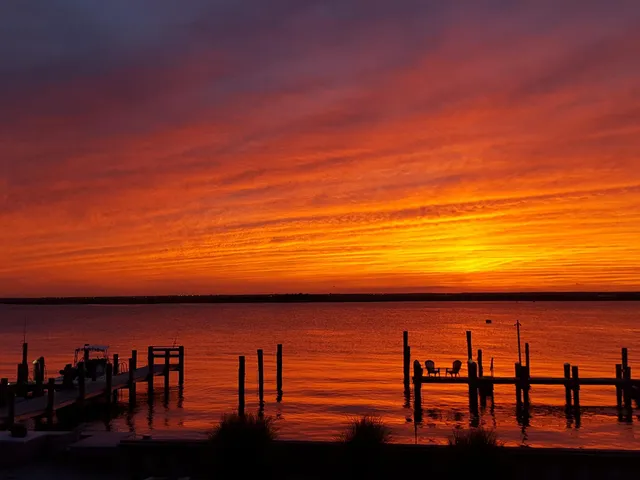 a view of a balcony with chairs